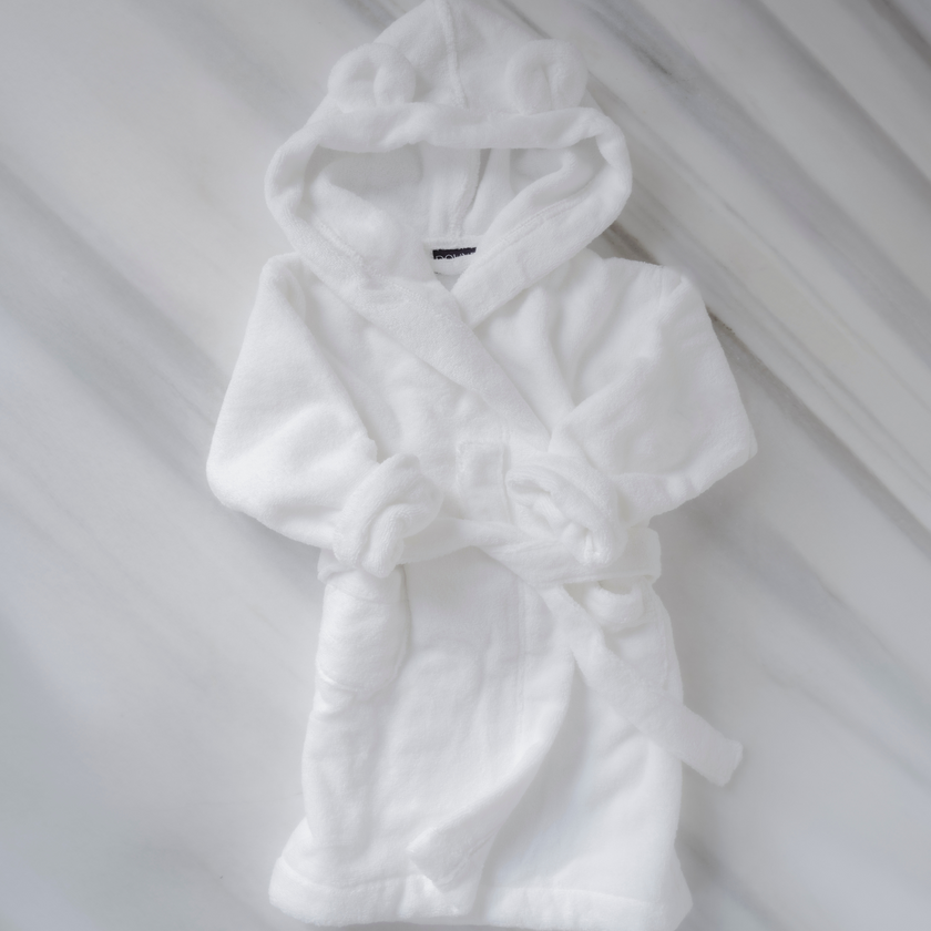 Bathrobe for kids in white with tedy ears, in size 4-6 years, flat lay shot